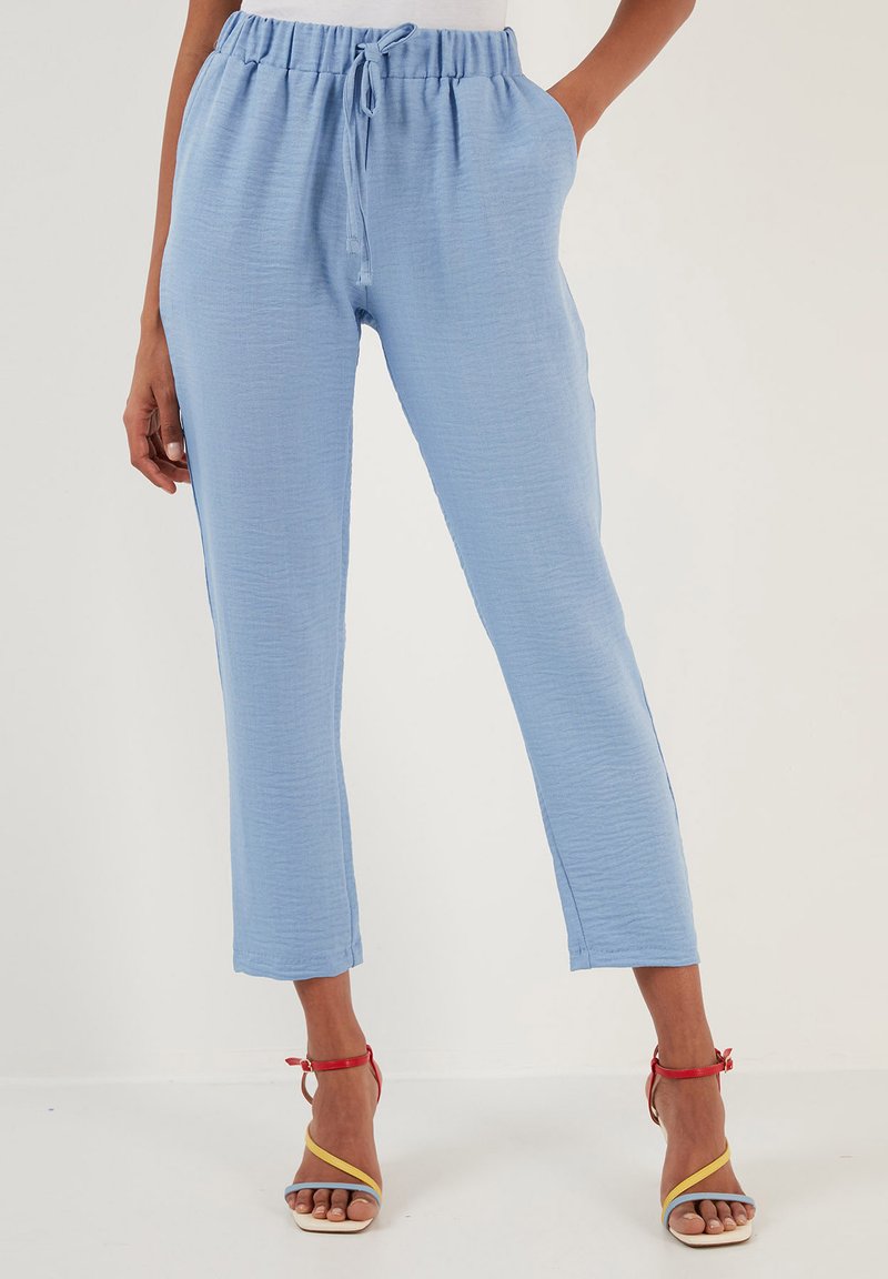 Noppies Regular Pants 'Naupli' in Rose | ABOUT YOU