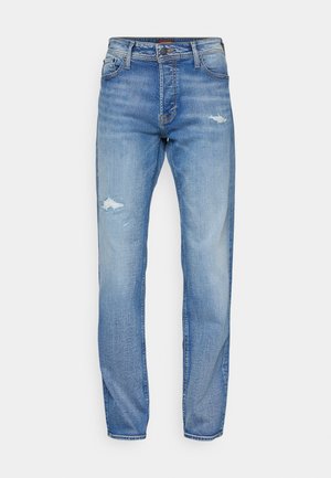 Világoskék denim farmer, egyenes lábbal, megviselt részletekkel és enyhe kopással. Klasszikus öt zsebes design, gombos záródás.