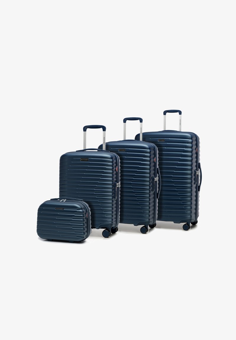 Set di valigie rigide navy, composto da quattro pezzi di diverse dimensioni. Texture a righe, manici telescopici e ruote girevoli. Design resistente.