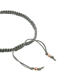 Bracelet en paracorde ajustable de couleur gris foncé avec une texture tressée, ornée de perles couleur cuivre et de deux cordons ajustables pour le réglage de la taille.
