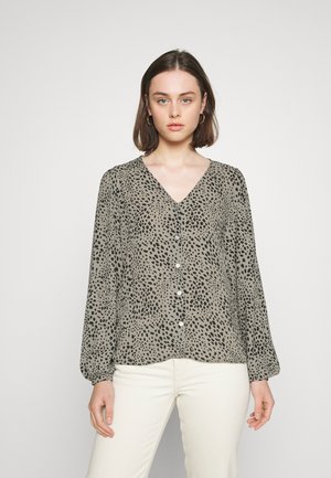 Elegantan bluzon dugih rukava s V-izrezom u maslinastoj boji s crnim leopard uzorkom, s prednjim kopčanjem na dugmad i manžetama. Glatka, lagana tkanina.