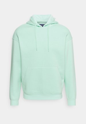 Mintgroene hoodie, gemaakt van zacht stof, met een kangoeroezak, capuchon met trekkoord en geribbelde manchetten en zoom. Ontspannen pasvorm.