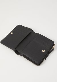 Black leather wallet with zip closure, featuring card slots, a snap button pocket, and smooth texture. Gold hardware accents.