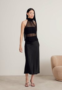 DRYKORN NEVIDA - Maxi skirt - black
