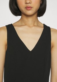 JDY Petite JDYLEONORA DRESS - Φόρεμα από ζέρσεϊ - black