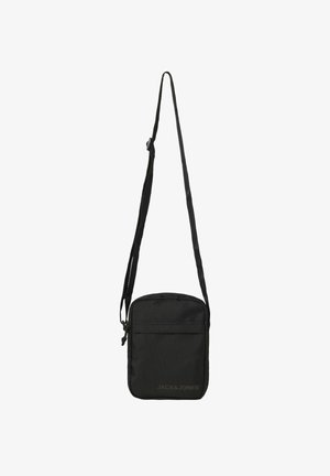 Sac bandoulière noir en tissu durable, doté d'une fermeture zippée, d'une sangle ajustable et d'une poche avant avec logo en relief.