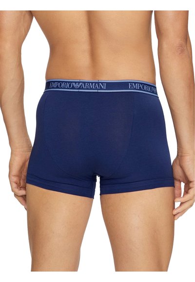 Navy blue Emporio Armani boxer shorts with a soft waistband and a snug fit, featuring a logo detail along the waistband and smooth fabric texture.
