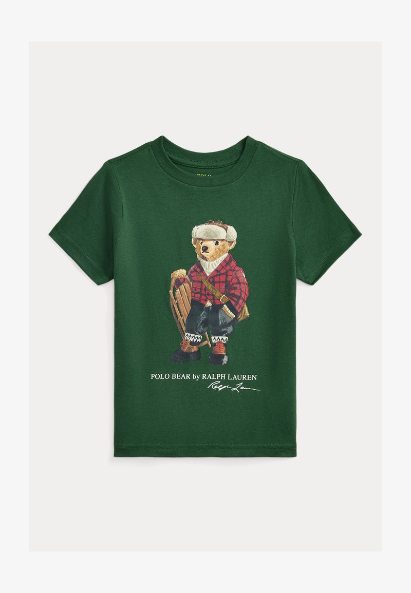 Žalia medvilninė marškinėliai su meška žieminiu aprangiu, languota marškinėliai, rogutėmis ir kepure. Yra taip pat tekstas „Polo Bear by Ralph Lauren“.