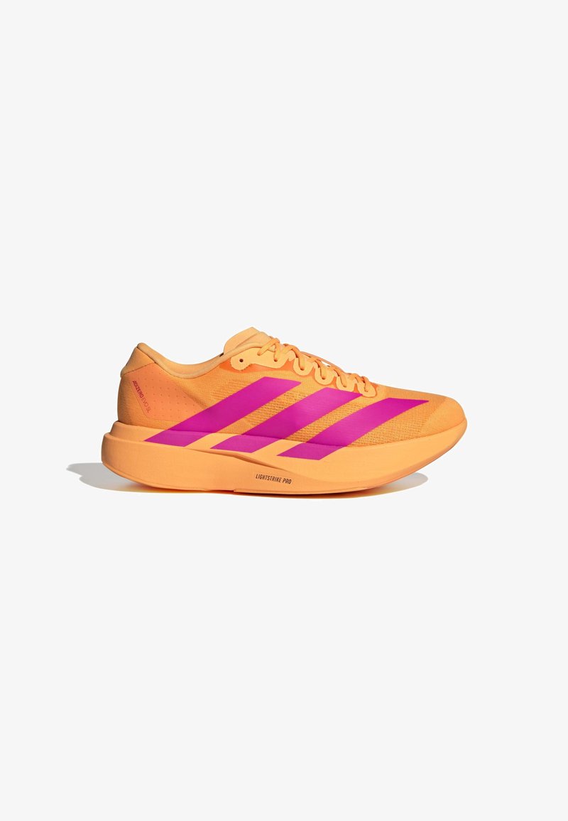 Orange running shoe with pink three-stripe design. Features a textured upper, smooth sole, and reinforced toe cap. Lightweight construction.