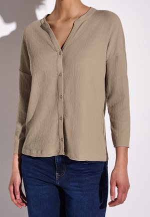 Blusa - beige