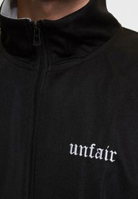 UNFAIR ATHLETICS Sweatjakke - black
