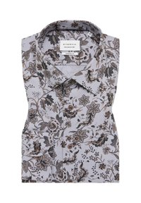 Korte mouwen shirt van lichtgrijze stof met een bloemenpatroon in bruine en zwarte tinten. Het heeft een knoopzakje en een modern kraagontwerp.