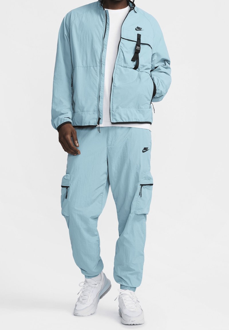 Nike Sportswear Summer jacket blue-grey (Pre-owned) Zalando - Main Image