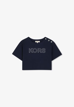 T-shirt court en coton bleu marine à manches courtes, avec un logo "KORS" blanc et trois boutons décoratifs sur l'épaule.