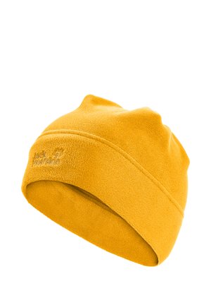 Gele fleece beanie met zichtbare stiksels en een geborduurd Jack Wolfskin-logo aan de voorkant.