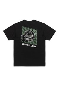 Black cotton t-shirt featuring a graphic design in white and green, including a grid pattern and stylized DC logo on the back.
