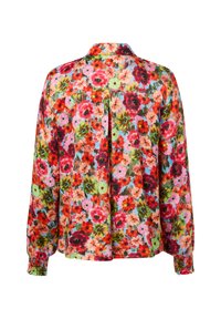 Floral-patterned long-sleeve shirt with a colorful background of red, pink, and green flowers; features a classic collar and gathered cuffs.