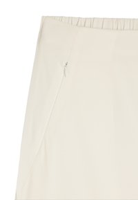 Jasno-beżowa spódnica o gładkiej fakturze, z elastycznym pasem i bocznym zamkiem błyskawicznym do zapięcia. Brak widocznych wzorów i akcentów.