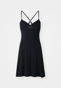 Zwarte slipdress met verstelbare gekruiste bandjes, kantpaneel bij de buste, zachte stof, aansluitende lijfje en een uitlopende zoom voor vrijheid van beweging.