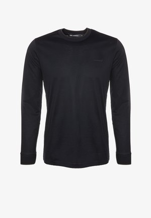 Zwarte langemouw T-shirt van zachte stof. Heeft een ronde halslijn, contrasterende manchetten en een discreet logo op de borst.