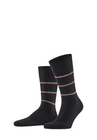 Calcetines negros con textura acanalada, que presentan tres franjas horizontales en rojo y blanco. Longitud estándar con refuerzo en el talón y la puntera.