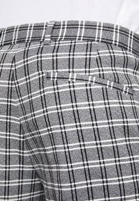 River Island Tygbyxor - black