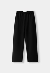 Schwarze, weit geschnittene Hose aus glattem Stoff. Mit einem elastischen Bund und Taschen an den Seiten. Minimalistisches Design ohne Muster.