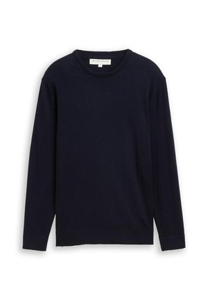 Pull à manches longues bleu marine en matière douce, avec un col rond, des poignets côtelés et un ourlet droit. Sans motifs ni accents.