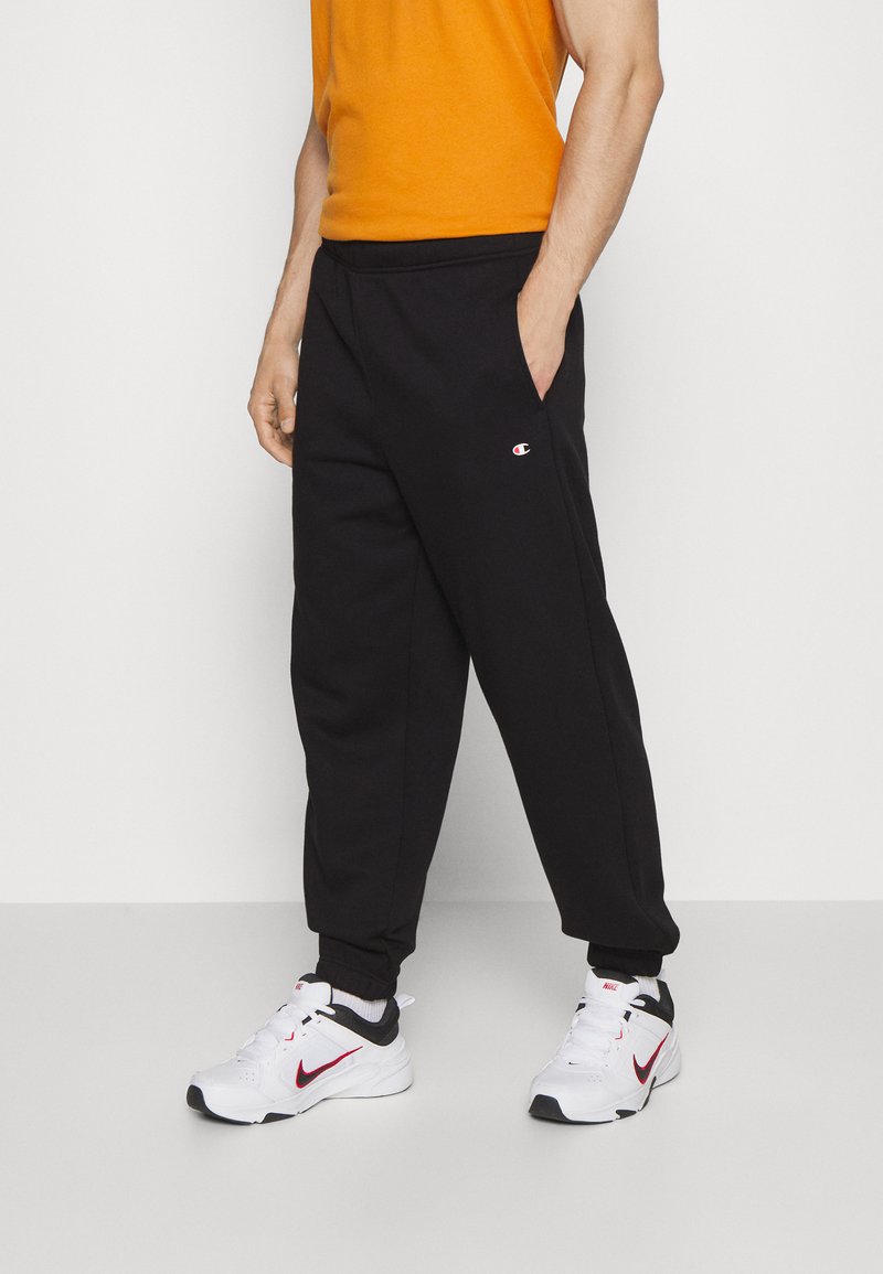 Champion ELASTIC CUFF PANTS LOOSE FIT Tracksuit bottoms black Zalando