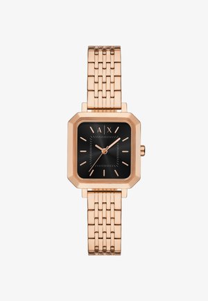 Reloj de metal en oro rosa con una esfera cuadrada negra, marcada por índices y manecillas en oro rosa, y una correa de malla vinculada.