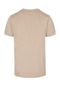 Beige short-sleeve t-shirt made of soft fabric, featuring a classic crew neckline and a simple, smooth texture with no prominent details.