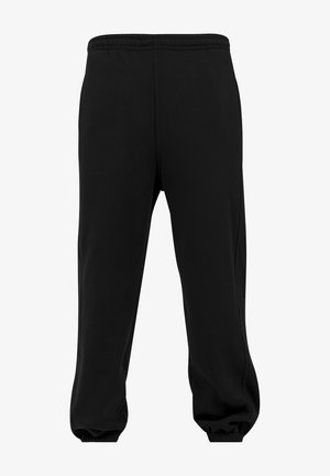 Czarne spodnie dresowe wykonane z miękkiego, gładkiego materiału. Posiadają elastyczny pas i elastyczne mankiety, boczne kieszenie oraz prosty krój.