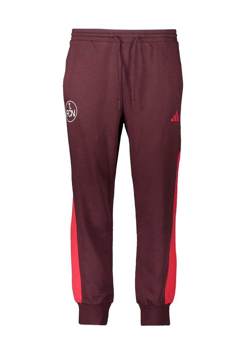 Bordeauxrode joggingbroek met rode zijpanelen, voorzien van een elastische tailleband en boorden, en een wit logo aan de voorkant. Gemaakt van zachte stof.