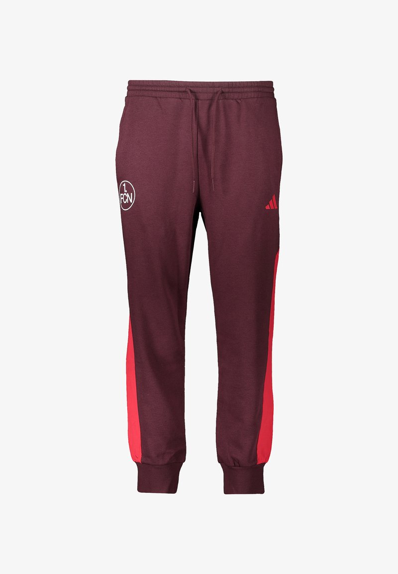 Bordeauxrode joggingbroek met rode zijpanelen, voorzien van een elastische tailleband en boorden, en een wit logo aan de voorkant. Gemaakt van zachte stof.