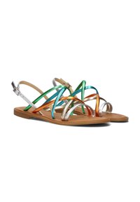 Multicolored flat sandals featuring metallic straps in green, silver, gold, and orange on a tan sole. Adjustable ankle strap included.