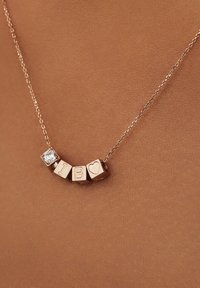 Isabel Bernard Bedel - rose gold-coloured