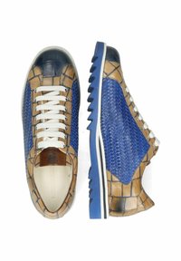 Sneakers with a woven blue textile and tan leather design, featuring a navy toe cap, white laces, and a textured blue outsole.