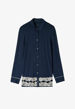 Marineblauwe blouse met lange mouwen, voorzien van een kanten rand aan de onderkant. Gemaakt van zachte stof met een klassieke kraag en manchetten.