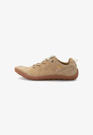 Brown suede athletic shoe with a textured rubber outsole, lace-up design, and padded collar; features a contrasting yellow accent on the side.