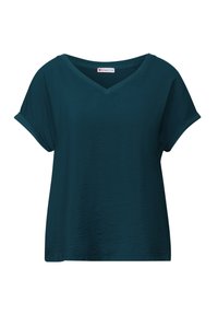 Turkusowa koszulka V-neck z krótkimi, podwiniętymi rękawami, charakteryzująca się teksturalną powierzchnią i swobodnym krojem. Z widoczną metką marki Street One w środku.