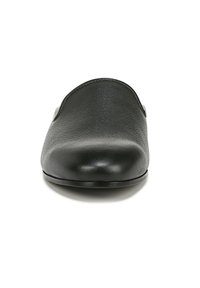Black leather slip-on shoe with a rounded toe, smooth texture, and minimalistic design. Features a low-profile sole and understated stitching.