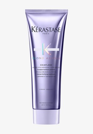 Kérastase Cicaplash behandling i en lilla plastik tube; har en blank finish, klart præget logo og detaljeret produktoplysninger på flere sprog.
