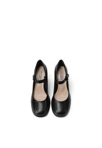 Scarpe Mary Jane in pelle nera con punta arrotondata, cinturino alla caviglia e finitura liscia. Interno foderato con una leggera branding sul lato.