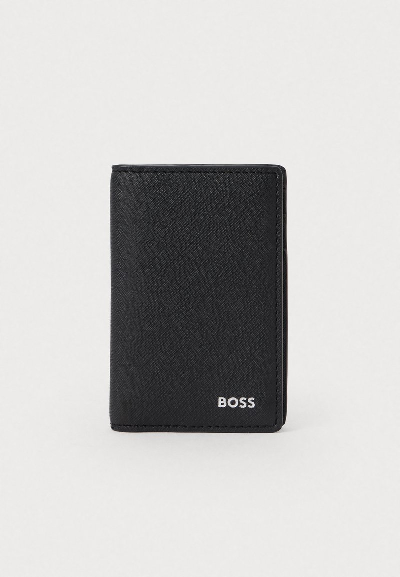 Black leather wallet with a textured finish, rectangular shape, and a silver logo on the front. Minimalist design with clean lines.