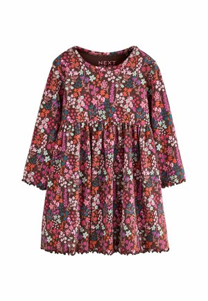 Langærmet brun pigekjole med pink, rød, blå og hvidt blomsterprint og bølgede kanter på ærmer og kant.