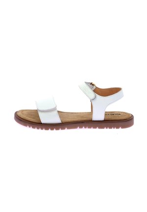 Sandalias blancas con dos correas ajustables, una plantilla acolchada y una suela de goma marrón con un patrón de banda de rodadura en zigzag.
