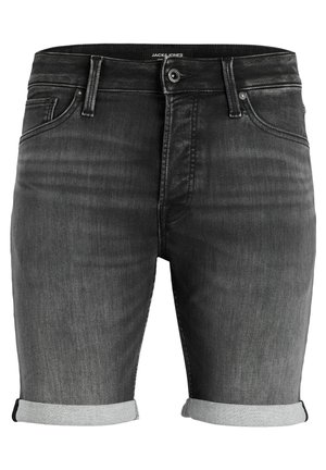 Zwarte denimshorts met een slim fit ontwerp, voorzien van opgerolde manchetten en subtiele vervagingsdetails. Versterkte voorkruiszakken en ritssluiting.