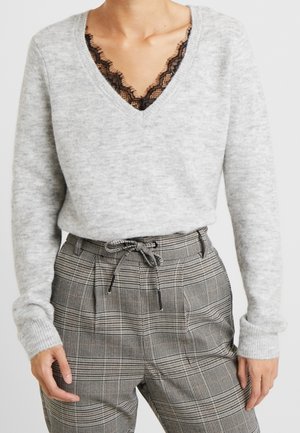 Striktrøje - mottled light grey