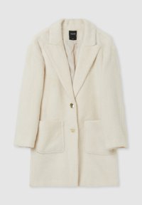 Cappotto in lana crema con colletto a risvolto, due tasche frontali e chiusura con un solo bottone. Tessuto morbido e vestibilità oversize.