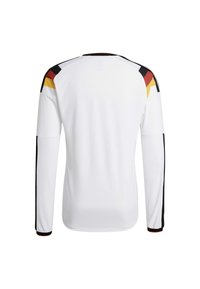 Long-sleeve white jersey with black, red, and yellow accents on shoulders and sleeves. Features a round neckline and textured fabric.